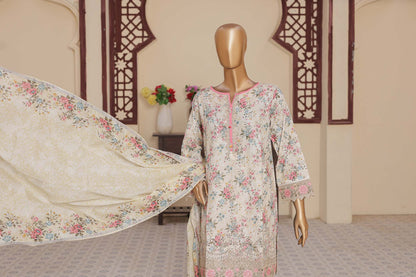 Floral dress on a mannequin with a draped fabric in a decorated room.
