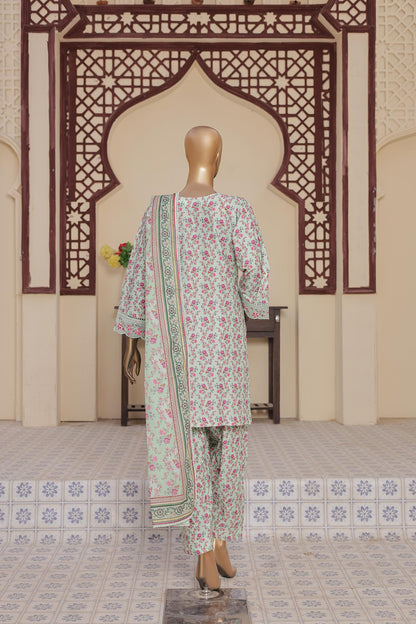 Mannequin wearing a floral outfit in a decorated room with intricate wall patterns.